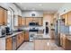 Spacious kitchen with an island, stainless steel appliances, and tile floors at 1614 E Kathleen Rd, Phoenix, AZ 85022