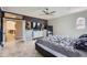 This main bedroom features tile flooring and a dark accent wall at 1614 E Kathleen Rd, Phoenix, AZ 85022