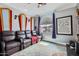 Home theater with comfortable recliner seating and theater decor at 1614 E Kathleen Rd, Phoenix, AZ 85022