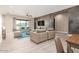 Comfortable living room with plush seating, a stylish accent wall, and mountain views at 1620 E Cloud Rd, Phoenix, AZ 85086