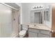 Clean bathroom with shower, vanity, and toilet at 16827 N 103Rd Ave, Sun City, AZ 85351