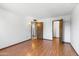 Open bedroom featuring closet space and hardwood floors at 16827 N 103Rd Ave, Sun City, AZ 85351