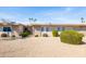 A charming single-story home featuring low-maintenance landscaping and an inviting facade at 16827 N 103Rd Ave, Sun City, AZ 85351