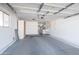 Spacious garage features ample storage space, access to laundry area and room for vehicles at 16827 N 103Rd Ave, Sun City, AZ 85351