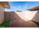 Enclosed patio with brick pavers, privacy walls and convenient gate access at 16827 N 103Rd Ave, Sun City, AZ 85351