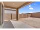 Backyard featuring covered patio with a block wall at 17033 W Royal Palm Rd, Waddell, AZ 85355