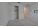 Bright bedroom featuring a closet with sliding doors to maximize space and comfort at 17033 W Royal Palm Rd, Waddell, AZ 85355
