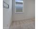 Well-lit bedroom featuring a bright window to maximize space and comfort at 17033 W Royal Palm Rd, Waddell, AZ 85355