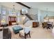Spacious living room with high ceilings, natural light, staircase, tiled floors and elegant furnishings at 17246 N 56Th Way, Scottsdale, AZ 85254
