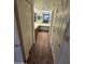 Hall bathroom with double sinks, vanity, and mirror at 17404 N 99Th Ave # 214, Sun City, AZ 85373
