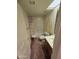 Cozy bathroom with a shower-tub combination, vanity, and a unique chair at 17404 N 99Th Ave # 214, Sun City, AZ 85373