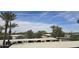 Scenic view of the neighborhood with trees, rooftops, and blue skies at 17404 N 99Th Ave # 214, Sun City, AZ 85373