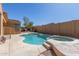 Relaxing pool and spa with mature backyard landscaping and outdoor grilling area, perfect for entertaining at 17953 W Willow Dr, Goodyear, AZ 85338