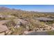 Neighborhood of desert homes, lush desert landscape, mature trees, and mountain views at 20453 N 95Th Pl, Scottsdale, AZ 85255