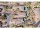 Aerial view of luxury homes featuring private pools and patios nestled in desert landscape at 20453 N 95Th Pl, Scottsdale, AZ 85255