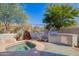 Outdoor kitchen featuring built-in grill and stone countertops, ideal for alfresco dining at 20453 N 95Th Pl, Scottsdale, AZ 85255