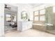 Bright primary bathroom with tub and glass shower at 20453 N 95Th Pl, Scottsdale, AZ 85255