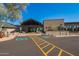 Community clubhouse featuring stone accents, covered entry, and accessible parking spots at 20453 N 95Th Pl, Scottsdale, AZ 85255