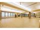 Well-lit fitness center with wood floors, mirrored walls, and state-of-the-art exercise equipment at 20453 N 95Th Pl, Scottsdale, AZ 85255