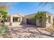 Charming single-story home with a two-car garage and low-maintenance desert landscaping at 20453 N 95Th Pl, Scottsdale, AZ 85255