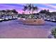 Organized golf cart parking area providing convenient access to the community's golf course at 20453 N 95Th Pl, Scottsdale, AZ 85255
