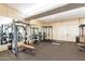 Fully equipped gym with weightlifting machines, mirrors, and ample workout space at 20453 N 95Th Pl, Scottsdale, AZ 85255