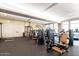 Well-equipped fitness center featuring modern exercise equipment and stone accents at 20453 N 95Th Pl, Scottsdale, AZ 85255