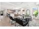 Open-concept living space with modern decor and seamless flow to the kitchen at 20453 N 95Th Pl, Scottsdale, AZ 85255