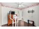 Bright bedroom with a ceiling fan and view of the ensuite bathroom at 21941 W Solano Dr, Buckeye, AZ 85326