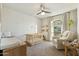 Bright Bedroom with crib, chair, changing table, shelving, and a large arched window at 2253 S Emerson --, Mesa, AZ 85210
