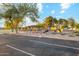 Community playground is equipped with a covered picnic area, slides, and play structures at 2253 S Emerson --, Mesa, AZ 85210
