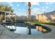 Relaxing backyard pool is perfect for enjoying the outdoors with sun loungers and shaded areas at 2253 S Emerson --, Mesa, AZ 85210