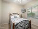 This bedroom offers a ceiling fan, and a beautiful view at 25624 N 51St Dr, Phoenix, AZ 85083