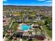 Community aerial view featuring a resort-style pool, lush landscaping, and cozy lounging areas at 29031 N 125Th Ln, Peoria, AZ 85383