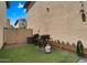 Outdoor space with artificial turf, barbeque and grill at 29031 N 125Th Ln, Peoria, AZ 85383