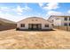 Spacious backyard ready for landscaping, ideal for entertaining and relaxation at 30382 W Vale Dr, Buckeye, AZ 85396