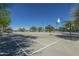 Outdoor basketball court with hoops and painted lines at 30382 W Vale Dr, Buckeye, AZ 85396