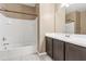 Bathroom featuring a shower-tub combination at 30382 W Vale Dr, Buckeye, AZ 85396