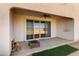 Covered patio with ceiling fan, offering a comfortable outdoor living space at 30382 W Vale Dr, Buckeye, AZ 85396