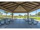 View of a picnic pavilion with tables and grill available for use at 30382 W Vale Dr, Buckeye, AZ 85396