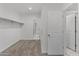 Walk-in closet with convenient shelving and seamless access to other areas at 30382 W Vale Dr, Buckeye, AZ 85396