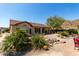 Spacious backyard featuring a paver patio, desert landscaping, and mountain views at 31525 N Gold Field Rd, San Tan Valley, AZ 85143