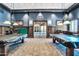 Billiards room with wood paneled walls, carpeted floors, and traditional billiard tables at 31525 N Gold Field Rd, San Tan Valley, AZ 85143