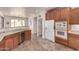 Well-equipped kitchen with stainless steel appliances and views into the backyard at 31525 N Gold Field Rd, San Tan Valley, AZ 85143