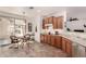 A well-lit kitchen showing a breakfast nook and stainless steel appliances at 31525 N Gold Field Rd, San Tan Valley, AZ 85143