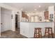 Open kitchen featuring a breakfast bar with stool seating, and a pantry at 31525 N Gold Field Rd, San Tan Valley, AZ 85143