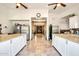 Spacious kitchen with white cabinets and stainless steel appliances at 31525 N Gold Field Rd, San Tan Valley, AZ 85143