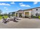 Beautiful backyard with a fire pit, covered patio and outdoor seating area at 4037 E Minton Cir, Mesa, AZ 85215