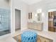 Bright bathroom with walk-in shower, vanity, and access to walk-in closet at 4037 E Minton Cir, Mesa, AZ 85215