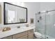 Bright bathroom with a glass-enclosed shower and updated vanity at 4037 E Minton Cir, Mesa, AZ 85215
